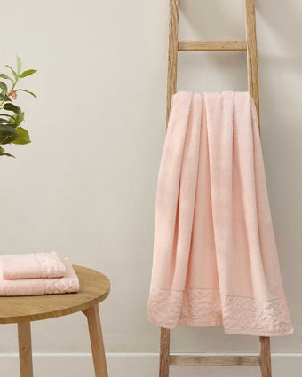 Marilyn Cotton Terry Blush Pink 6 Piece Towel Set in the bathroom on display