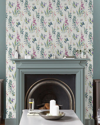 Meadowvale Sprigs Violet Wallpaper on a wall.