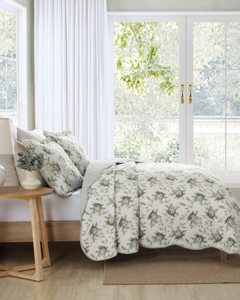 Portland Floral Green Cotton Reversible Quilt Set side view with large open window