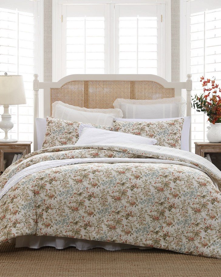 https://www.lauraashleyusa.com/cdn/shop/products/bramble-floral-beige-cotton-reversible-comforter-set-317401.jpg?v=1693438678